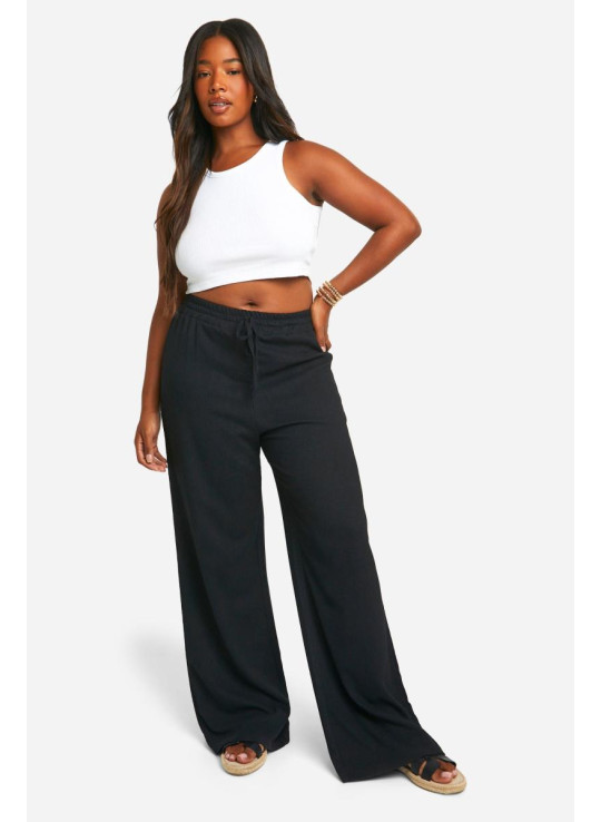 Плюс текстуровані широкі брюки