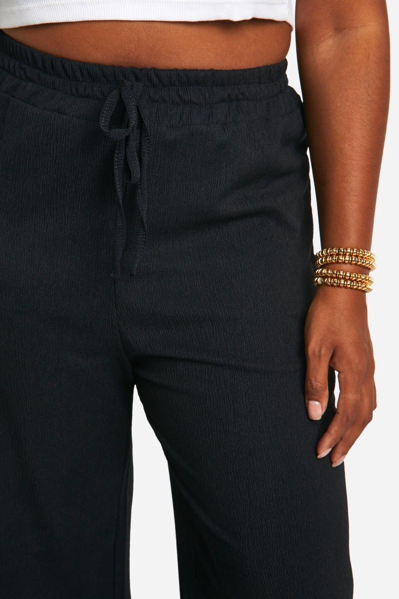 Плюс текстуровані широкі брюки