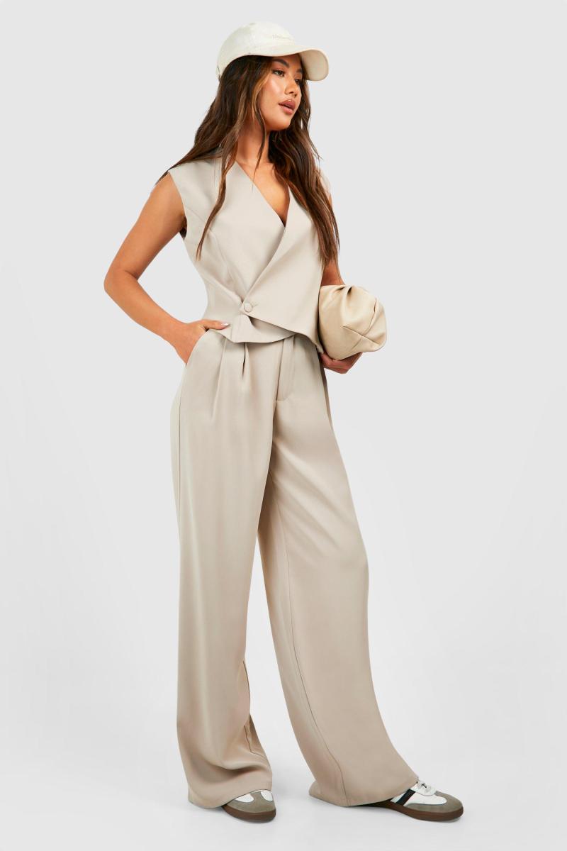 Асиметричний жилет на ґудзиках