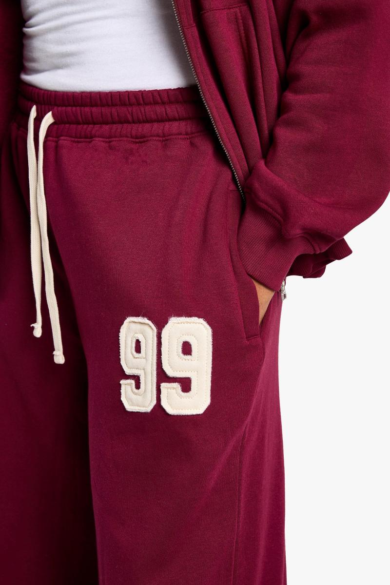 Плюс контраст Drawcord Applique Прямі пробіжки