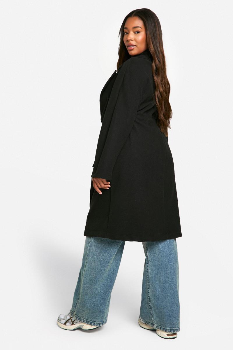 Вовняне пальто зі шнурком на талії