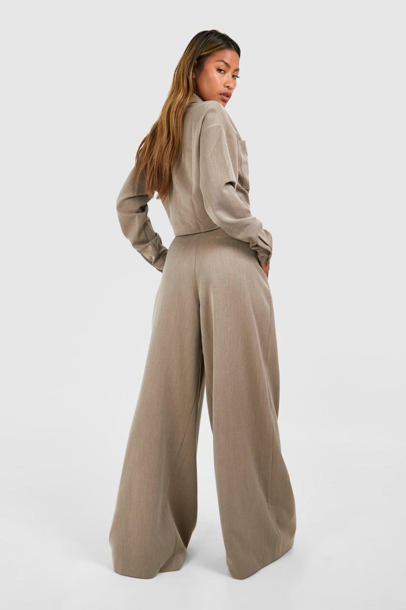 Широкі плісировані штани з низькою посадкою