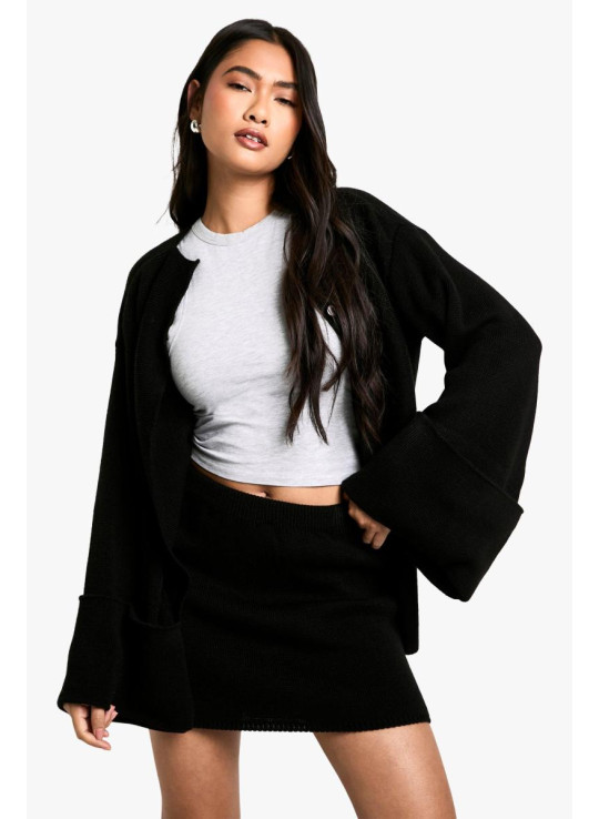 В'язаний кардиган з довгим виворотом і манжетами В'язаний кардиган з довгим виворотом і манжетами