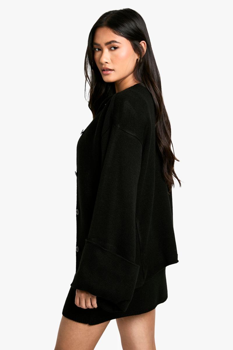 В'язаний кардиган з довгим виворотом і манжетами