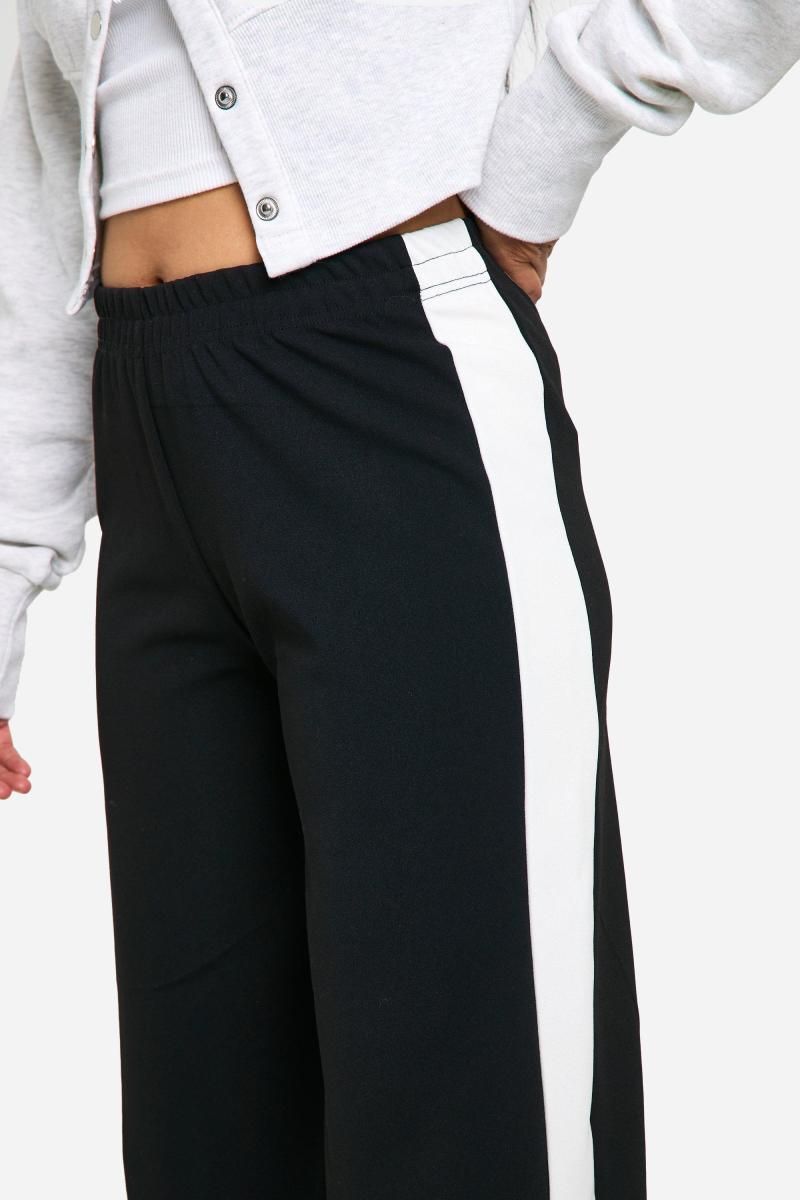 Маленькі широкі штани в контрастну смужку